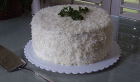 A hand-frosted coconut layer cake